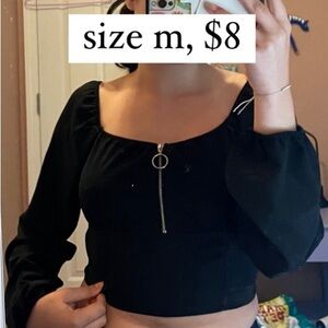 slightly cropped black top